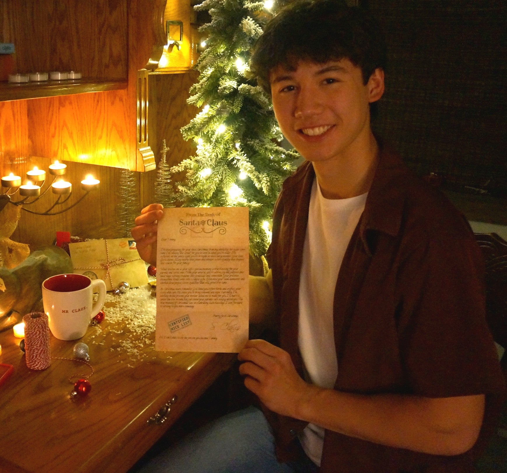 Founder of TheNoteShop holding his very first product