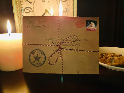 Decorative envelope with string and a official Santa wax seal